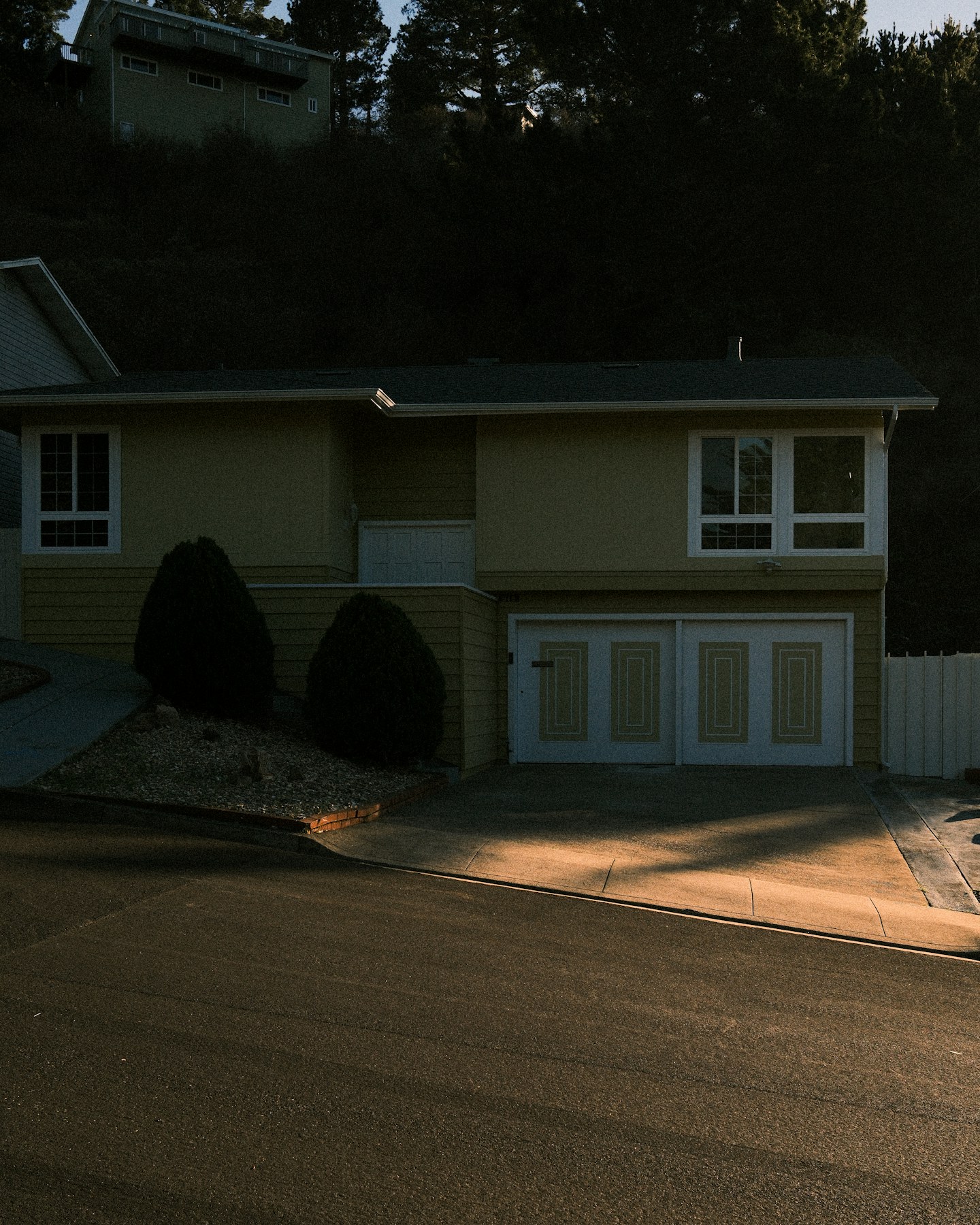A suburban home with a driveway and garage